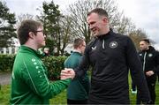 19 March 2024; Republic of Ireland assistant coach Glenn Whelan meets David Crawford, from Donegal Town, of the Ireland Down Syndrome Futsal squad on a visit to a Republic of Ireland training session at the FAI National Training Centre in Abbotstown, Dublin. Photo by Stephen McCarthy/Sportsfile