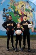21 March 2024; A group of SARI's future Young Leaders, from left, Roqeeb, Mia and Roberto, celebrate International Day for the Elimination of Racial Discrimination at St Laurence O’Toole Recreation Centre in Dublin. Photo by Seb Daly/Sportsfile