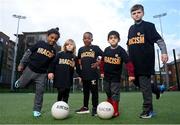 21 March 2024; A group of SARI's future Young Leaders, from left, Aaron, Jager, Ola, Alberto and Max, celebrate International Day for the Elimination of Racial Discrimination at St Laurence O’Toole Recreation Centre in Dublin. Photo by Seb Daly/Sportsfile