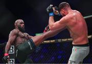 22 March 2024; Corey Anderson, left, in action against Karl Moore in their light heavyweight title bout during the Bellator Champions Series at the SSE Arena in Belfast. Photo by David Fitzgerald/Sportsfile