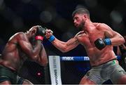 22 March 2024; Karl Moore, right, in action against Corey Anderson in their light heavyweight title bout during the Bellator Champions Series at the SSE Arena in Belfast. Photo by David Fitzgerald/Sportsfile