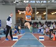 23 March 2024; Clodagh Donohoe of Nenagh Olympic A.C. Tipperary competes in the girls under 18 triple jump during day one of the 123.ie National Juvenile Indoor Championships at the TUS International Arena in Athlone. Photo by Stephen Marken/Sportsfile