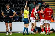 22 March 2024; Seán O'Brien of Munster celebrates with team-mates Craig Casey, 9, and Josh Wycherley, 1, after scoring his side's second try during the United Rugby Championship match between Ospreys and Munster at the Swansea.com Stadium in Swansea, Wales. Photo by Gruffydd Thomas/Sportsfile