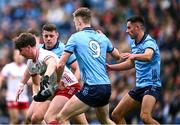 24 March 2024; Aodhan Donaghy of Tyrone is tackled by Tom Lahiff, 9, Brian Howard and Niall Scully of Dublin during the Allianz Football League Division 1 match between Dublin and Tyrone at Croke Park in Dublin. Photo by Ray McManus/Sportsfile