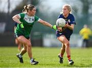 24 March 2024; Niamh Murphy of Carlow in action against Brenda Bannon of Fermanagh during the Lidl LGFA National League Division 4 semi-final match between Fermanagh and Carlow at Dowdallshill GAA Club in Dundalk, Louth. Photo by Tyler Miller/Sportsfile
