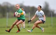 24 March 2024; Charlene Tyrrell of Leitrim in action against Mairead Kavanagh of Limerick during the Lidl LGFA National League Division 4 semi-final match between Leitrim and Limerick at Pádraig Pearses GAA Club in Roscommon. Photo by Seb Daly/Sportsfile