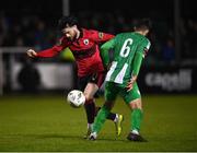 25 March 2024; Adam Wixte of Longford Town in action against Guillermo Almirall of Bray Wanderers during the SSE Airtricity Men's First Division match between Bray Wanderers and Longford Town at Carlisle Grounds in Bray, Wicklow. Photo by David Fitzgerald/Sportsfile