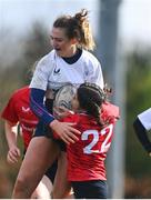 27 March 2024; Moya Murtagh of Midlands is tackled by Alysah Hollywood of North East during the BearingPoint Sarah Robinson Cup Round 5 match between Midlands and North East at Carlow Institute of Technology in Carlow. Photo by Tyler Miller/Sportsfile