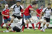 13 September 2013; JJ Hanrahan, Munster, attempts to break through the Zebre defence. Celtic League 2013/14, Round 2, Zebre v Munster, Stadio XXV Aprile, Parma, Italy. Picture credit: Roberto Bregani / SPORTSFILE