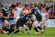 13 September 2013; Nick Williams, Ulster, is tackled by Ed Kalman and Jonny Gray, Glasgow Warriors. Celtic League 2013/14, Round 2, Ulster v Glasgow Warriors, Ravenhill Park, Belfast, Co. Antrim. Picture credit: Oliver McVeigh / SPORTSFILE