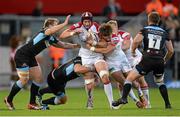 13 September 2013; Dan Tuohy, Ulster, supported by team-mate Ian Porter, is tackled by Jonny Gray, Glasgow Warriors. Celtic League 2013/14, Round 2, Ulster v Glasgow Warriors, Ravenhill Park, Belfast, Co. Antrim. Picture credit: Oliver McVeigh / SPORTSFILE