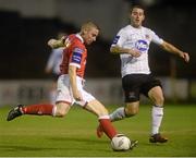 13 September 2013; Glen Cronin, Shelbourne, in action against Kurtis Byrne, Dundalk. FAI Ford Cup Quarter-Final, Shelbourne v Dundalk, Tolka Park, Dublin. Picture credit: Brian Lawless / SPORTSFILE