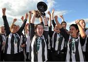 14 September 2013; Kilcullen FC captain Clare Kelly lifts the cup with her team-mates. FAI Umbro Women’s Junior Cup Final, Kilcullen FC v Corrib Rangers FC, Newbridge Town FC, Newbridge, Co. Kildare. Picture credit: Brian Lawless / SPORTSFILE