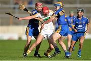 14 September 2013; Michael Bradley, Antrim, in action against Davy O'Halloran, left, and Seadna Morey, Clare. Bord Gáis Energy GAA Hurling Under 21 All-Ireland 'A' Championship Final, Antrim v Clare, Semple Stadium, Thurles, Co. Tipperary. Picture credit: Brendan Moran / SPORTSFILE