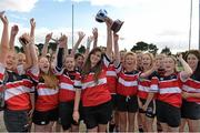 14 September 2013; Wicklow RFC team captain Rachel Griffey lifts the under-18 cup as her team-mates celebrate after winning the South East Underage Blitz. Wexford Wanderers RFC, Wexford. Picture credit: Matt Browne / SPORTSFILE