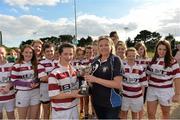 14 September 2013; Tullow captain Grace Kelly is presented with the Under-15 cup by Leinster Rugby's Debbie Carthy at the South East Underage Blitz. Wexford Wanderers RFC, Wexford. Picture credit: Matt Browne / SPORTSFILE