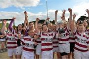 14 September 2013; Tullow captain Grace Kelly lifts the Under-15 cup as her team-mates celebrate after winning the South East Underage Blitz. Wexford Wanderers RFC, Wexford. Picture credit: Matt Browne / SPORTSFILE