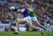 30 March 2024; Evan O'Carroll of Laois in action against Mark Diffley of Leitrim during the Allianz Football League Division 4 final match between Laois and Leitrim at Croke Park in Dublin. Photo by Shauna Clinton/Sportsfile