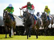 31 March 2024; Lucky Lyreen, centre, with Danny Gilligan up, on their way to winning the Cawley Furniture Novice Handicap Hurdle, from eventual second place Buachaillbocht, left, witgh Mark Walsh up, on day two of the Fairyhouse Easter Festival at Fairyhouse Racecourse in Ratoath, Meath. Photo by Seb Daly/Sportsfile