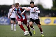 1 April 2024; Sam Durrant of Dundalk in action against Andrew Quinn of Drogheda United during the SSE Airtricity Men's Premier Division match between Dundalk and Drogheda United at Oriel Park in Dundalk, Louth. Photo by Ben McShane/Sportsfile
