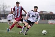 1 April 2024; Ryan O'Kane of Dundalk in action against Killian Cailloce of Drogheda United during the SSE Airtricity Men's Premier Division match between Dundalk and Drogheda United at Oriel Park in Dundalk, Louth. Photo by Ben McShane/Sportsfile