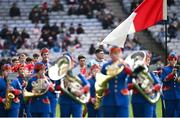 31 March 2024; Derry goalkeeper Odhran Lynch and his teammates walk behind The Artane Band before the Allianz Football League Division 1 Final match between Dublin and Derry at Croke Park in Dublin. Photo by Ramsey Cardy/Sportsfile