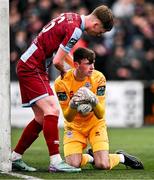 1 April 2024; Drogheda United goalkeeper Andrew Wogan with Oisin Gallagher of Drogheda United during the SSE Airtricity Men's Premier Division match between Dundalk and Drogheda United at Oriel Park in Dundalk, Louth. Photo by Ben McShane/Sportsfile