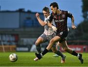 5 April 2024; Dylan Connolly of Bohemians in action against Darragh Power of Waterford during the SSE Airtricity Men's Premier Division match between Bohemians and Waterford at Dalymount Park in Dublin. Photo by Piaras Ó Mídheach/Sportsfile