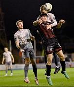 5 April 2024; James Clarke of Bohemians in action against Rowan McDonald of Waterford during the SSE Airtricity Men's Premier Division match between Bohemians and Waterford at Dalymount Park in Dublin. Photo by Piaras Ó Mídheach/Sportsfile