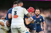 13 April 2024; Josh van der Flier of Leinster is tackled by Uini Atonio of La Rochelle during the Investec Champions Cup quarter-final match between Leinster and La Rochelle at the Aviva Stadium in Dublin. Photo by Ramsey Cardy/Sportsfile