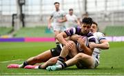 28 April 2024; Conor Phillips of Terenure College is tackled by Matthew Bowen of Cork Constitution during the Energia All-Ireland League Men's Division 1A final match between Terenure College and Cork Constitution at the Aviva Stadium in Dublin. Photo by Seb Daly/Sportsfile