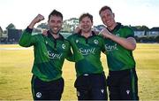 10 May 2024; Ireland players, from left, Andrew Balbirnie, Barry McCarthy and Harry Tector celebrate after their side's victory in match one of the Floki Men's T20 International Series between Ireland and Pakistan at Castle Avenue Cricket Ground in Dublin. Photo by Seb Daly/Sportsfile