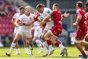 11 May 2024; Stuart McCloskey of Ulster is held up by Gareth Davies of Scarlets during the United Rugby Championship match between Scarlets and Ulster at Parc Y Scarlets in Llanelli, Wales. Photo by Gruff Thomas/Sportsfile