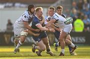 11 May 2024; Jamie Osborne of Leinster is tackled by Morgan Morris, left, and Dewi Lake of Ospreys during the United Rugby Championship match between Leinster and Ospreys at the RDS Arena in Dublin. Photo by Ramsey Cardy/Sportsfile