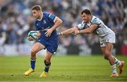 11 May 2024; Jordan Larmour of Leinster is tackled by Luke Morgan of Ospreys during the United Rugby Championship match between Leinster and Ospreys at the RDS Arena in Dublin. Photo by Ramsey Cardy/Sportsfile