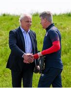 16 May 2024; Newly appointed manager Stephen Kenny is greeted by St Patrick's Athletic chairman Garrett Kelleher on arrival for a St Patrick's Athletic training session at Sport Ireland Campus in Abbotstown, Dublin. Photo by Stephen McCarthy/Sportsfile