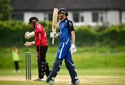 16 May 2024; Tim Tector of Leinster Lightning raises his bat after bringing up his 50 during the Inter-Provincial IP20 Trophy match between Leinster Lightning and Munster Reds at Sydney Parade, Sandymount in Dublin. Photo by Harry Murphy/Sportsfile