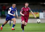 17 May 2024; Jason Abbott of Cobh Ramblers in action against Yoyo Mahdy of Treaty United during the SSE Airtricity Men's First Division match between Cobh Ramblers and Treaty United at St. Colman's Park in Cobh, Cork. Photo by Michael P Ryan/Sportsfile