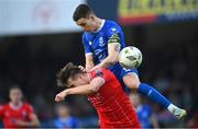 17 May 2024; Darragh Leahy of Waterford in action against Matty Smith of Shelbourne during the SSE Airtricity Men's Premier Division match between Shelbourne and Waterford at Tolka Park in Dublin. Photo by David Fitzgerald/Sportsfile