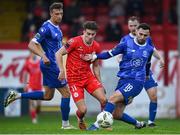 17 May 2024; Matty Smith of Shelbourne in action against Robbie McCourt of Waterford during the SSE Airtricity Men's Premier Division match between Shelbourne and Waterford at Tolka Park in Dublin. Photo by David Fitzgerald/Sportsfile