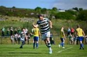 19 May 2024; Garbhan Friel of Cockhill Celtic celebrates his side's fourth goal, scored by Luke Rudden, during the Sports Direct Men’s FAI Cup First Round match between Cockhill Celtic and Ayrfield United at Charlie O'Donnell Sports Grounds in Buncrana, Donegal. Photo by Ramsey Cardy/Sportsfile