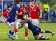 17 May 2024; Jack O'Donoghue of Munster is tackled by Wes Goosen of Edinburgh during the United Rugby Championship match between Edinburgh and Munster at the Hive Stadium in Edinburgh, Scotland. Photo by Mark Scates/Sportsfile