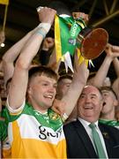 22 May 2024; Dan Bourke of Offaly lifts the cup after the oneills.com Leinster GAA Hurling U20 Championship final match between Dublin and Offaly at Laois Hire O'Moore Park in Portlaoise, Laois. Photo by Ray McManus/Sportsfile