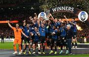 22 May 2024; Atalanta BC captain Berat Gjimshiti, 19, and teammate Ademola Lookman celebrate with the cup after the 2023/24 UEFA Europa League final between Atalanta BC and Bayer 04 Leverkusen at the Dublin Arena in Dublin, Ireland. Photo by David Fitzgerald/Sportsfile