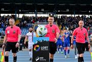 23 May 2024; Referee Paul Norton collects the matchball during the SSE Airtricity LGBT Ireland Football Takeover at the Regional Sports Centre in Waterford before the SSE Airtricity Men's Premier Division match between Waterford and Drogheda United. Photo by Tyler Miller/Sportsfile