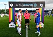 23 May 2024; Referee Paul Norton performs the coin toss alongside captains Gary Deegan of Drogheda United and Darragh Leahy of Waterford during the SSE Airtricity LGBT Ireland Football Takeover at the Regional Sports Centre in Waterford before the SSE Airtricity Men's Premier Division match between Waterford and Drogheda United. Photo by Tyler Miller/Sportsfile
