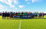 24 May 2024; Players from both side's pose for a photograph with an LGBT Ireland banner during the SSE Airtricity LGBT Ireland Football Takeover at Turner's Cross in Cork before the SSE Airtricty Men's First Division match between Cork City FC and Treaty United FC at Turner's Cross in Cork. Photo by Tyler Miller/Sportsfile