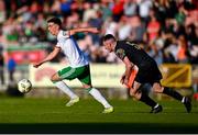 24 May 2024; Barry Coffey of Cork City in action against Lee Devitt of Treaty United during the SSE Airtricity Men's First Division match between Cork City and Treaty United at Turner's Cross in Cork. Photo by Tyler Miller/Sportsfile