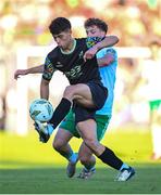 24 May 2024; Fionn Doherty of Treaty United in action against Cian Bargary of Cork City during the SSE Airtricity Men's First Division match between Cork City and Treaty United at Turner's Cross in Cork. Photo by Tyler Miller/Sportsfile