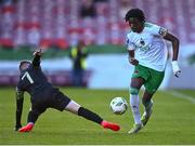 24 May 2024; Jaden Umeh of Cork City evades the tackle of William Armshaw of Treaty United during the SSE Airtricity Men's First Division match between Cork City and Treaty United at Turner's Cross in Cork. Photo by Tyler Miller/Sportsfile